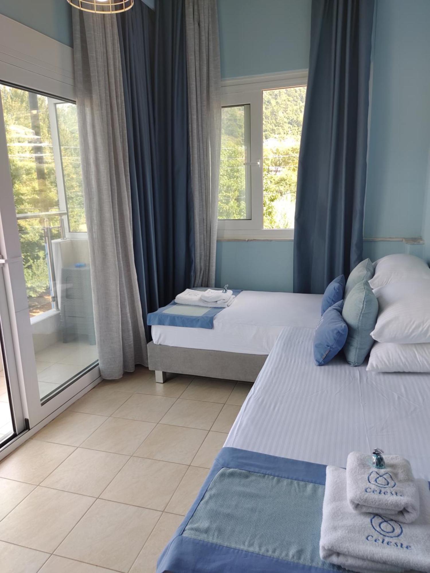 Celeste Deluxe Apartments สกาลา โปเตมิอัส ห้อง รูปภาพ