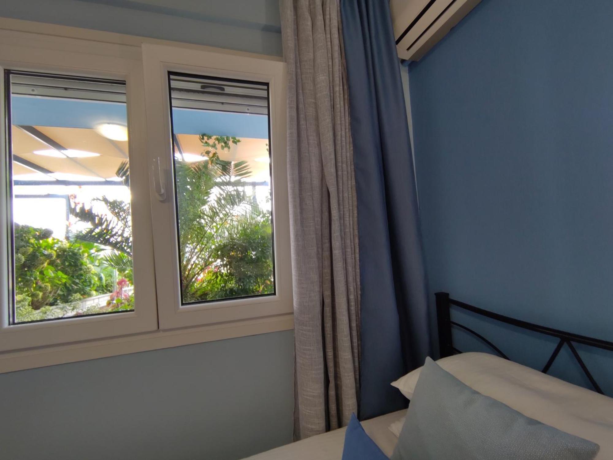 Celeste Deluxe Apartments สกาลา โปเตมิอัส ห้อง รูปภาพ