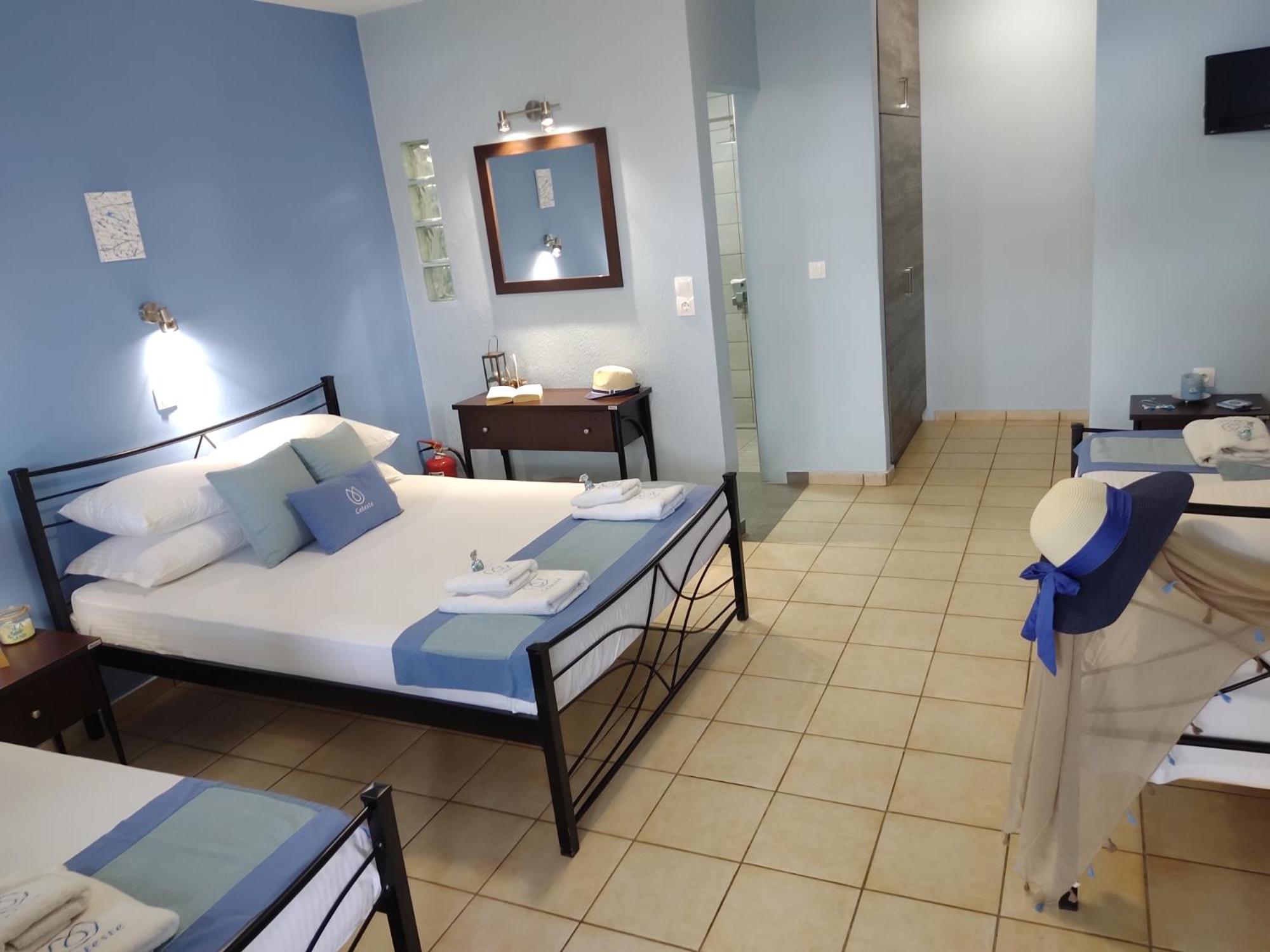 Celeste Deluxe Apartments สกาลา โปเตมิอัส ห้อง รูปภาพ